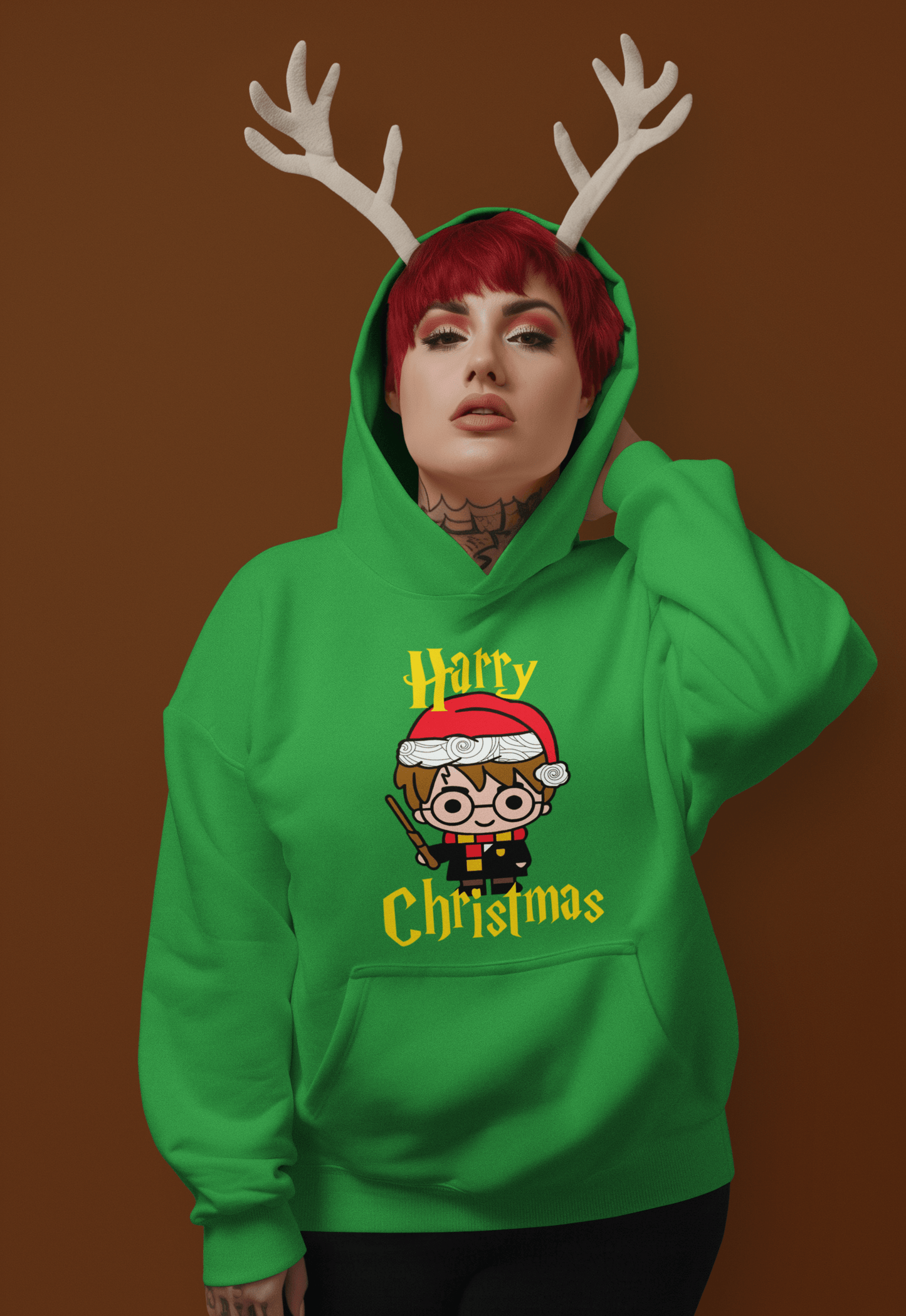 🎄 Sudadera "Harry Christmas" 🧙♂️ - ¡La magia navideña llegó a tu armario! modelo con cuernos de reno.